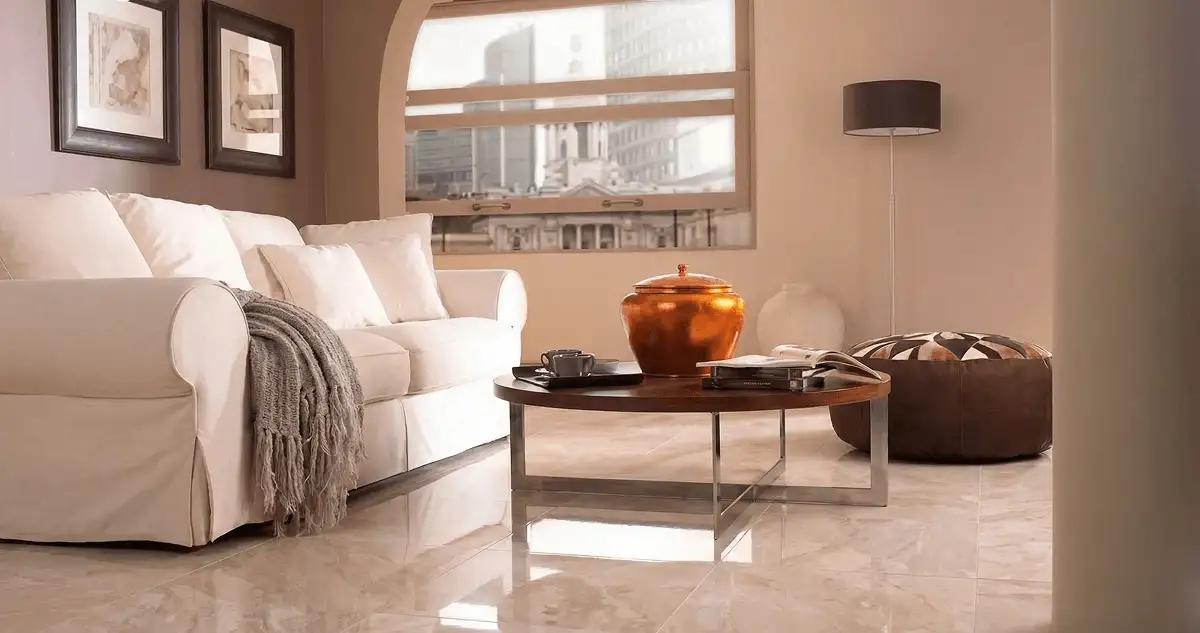 Modern living room with professionally installed marble flooring, a beige sofa, coffee table in Staten Island, NY