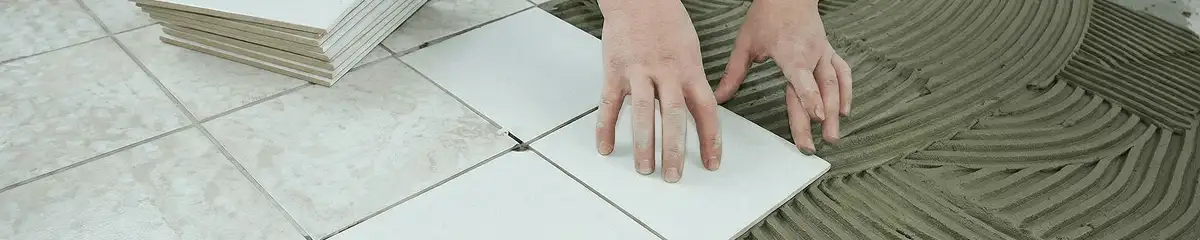 Professional installing white tile floors in Staten Island, NY