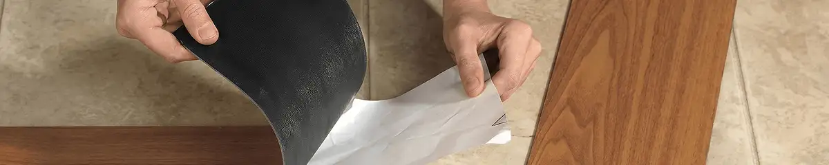 A professional installing vinyl flooring in Staten Island, NY